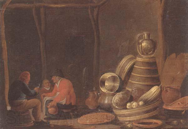 Jan Spanjaert A barn interor with peasants drinking and smoking beside a collection of kitchen utensils